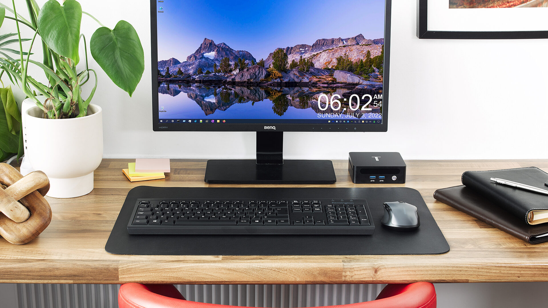 Black — on the desk